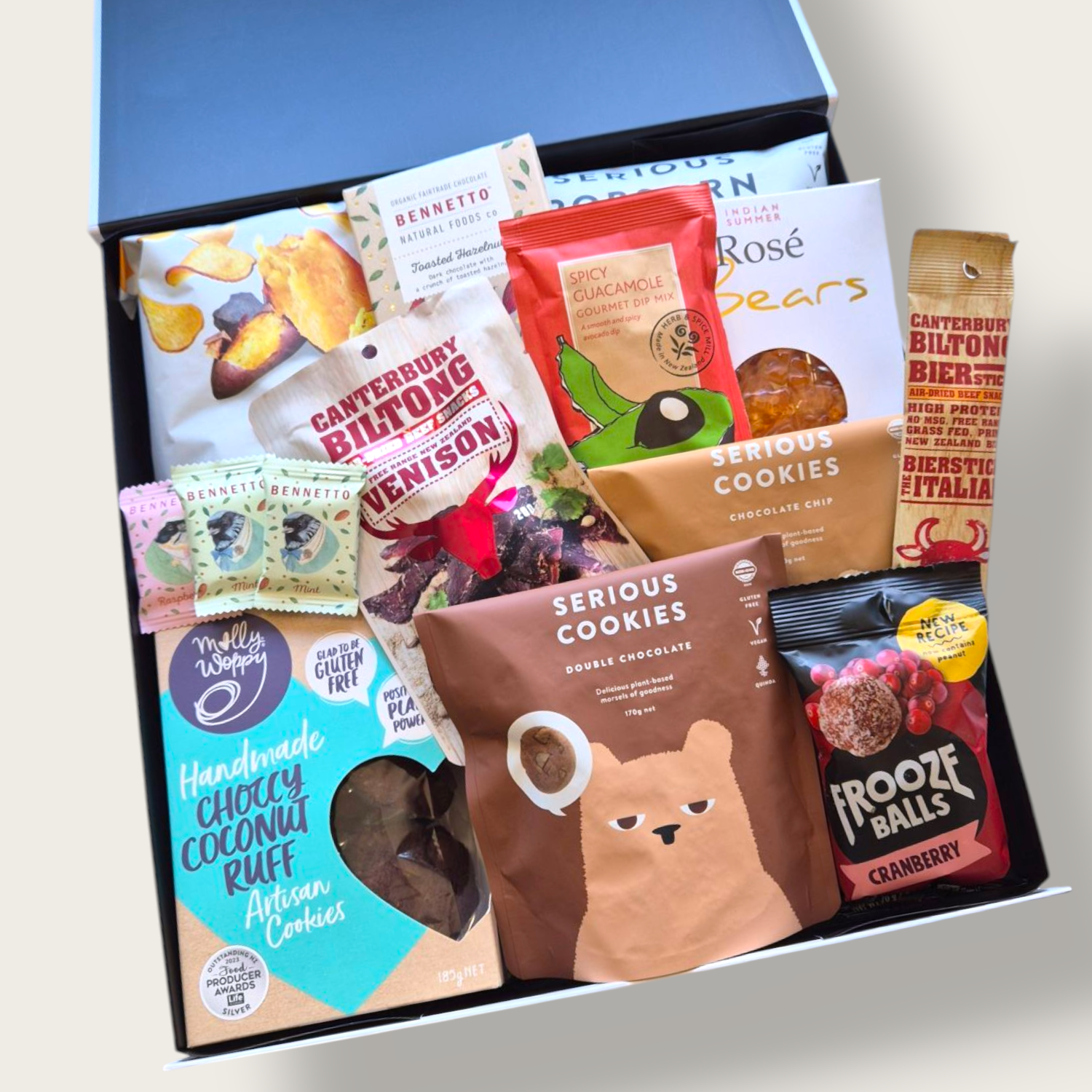 Treats on Repeat gluten-free dairy-free gift box featuring cookies, biltong, chocolate, and snacks. Perfect allergy friendly hamper for gifting NZ wide.