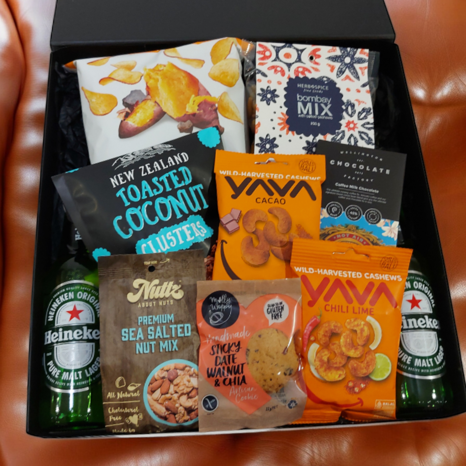 Just for him gift basket for men with Beer. Nuts, Chips, Chocolate & more presented in a modern gift box.