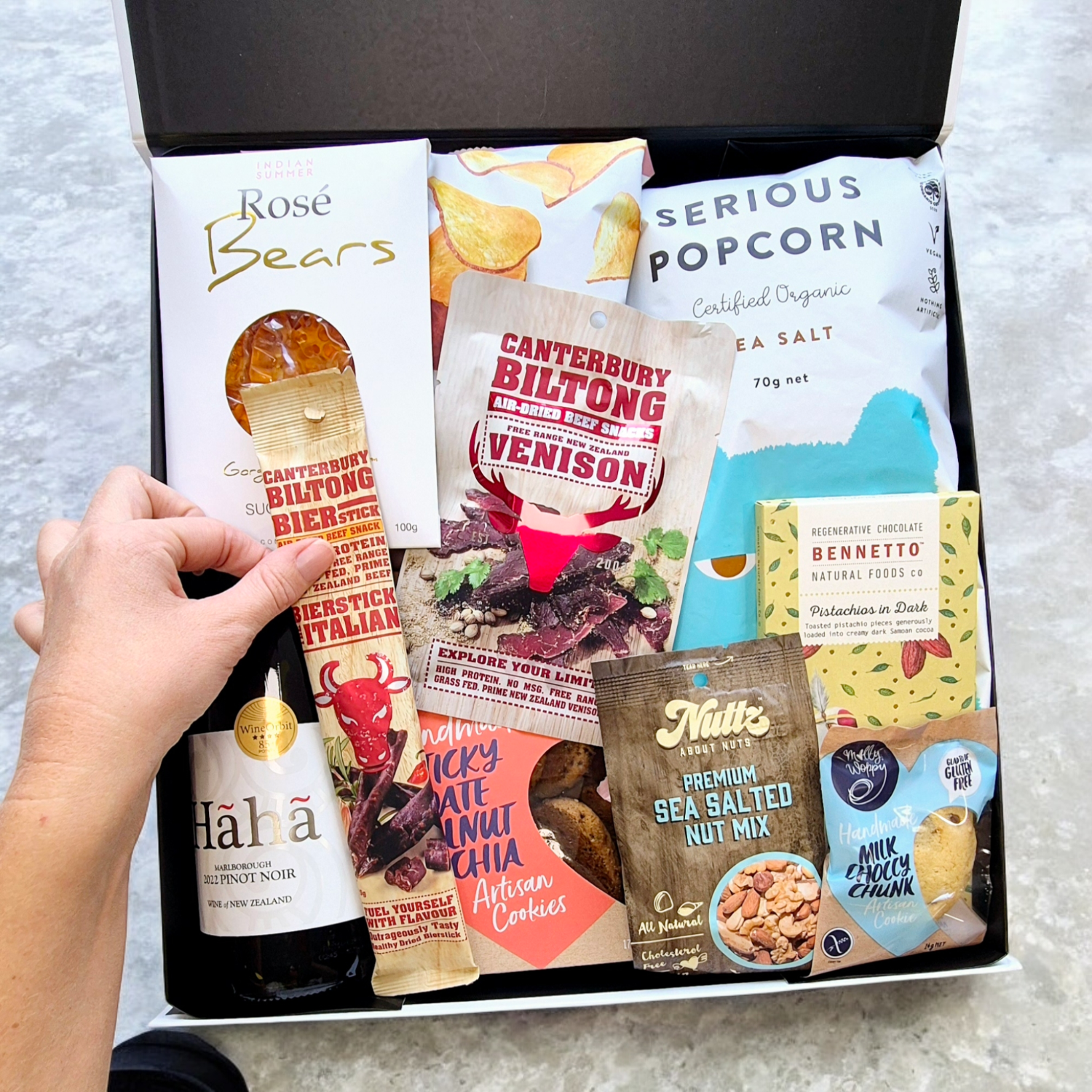 Taranaki gift box with wine and snacks.
