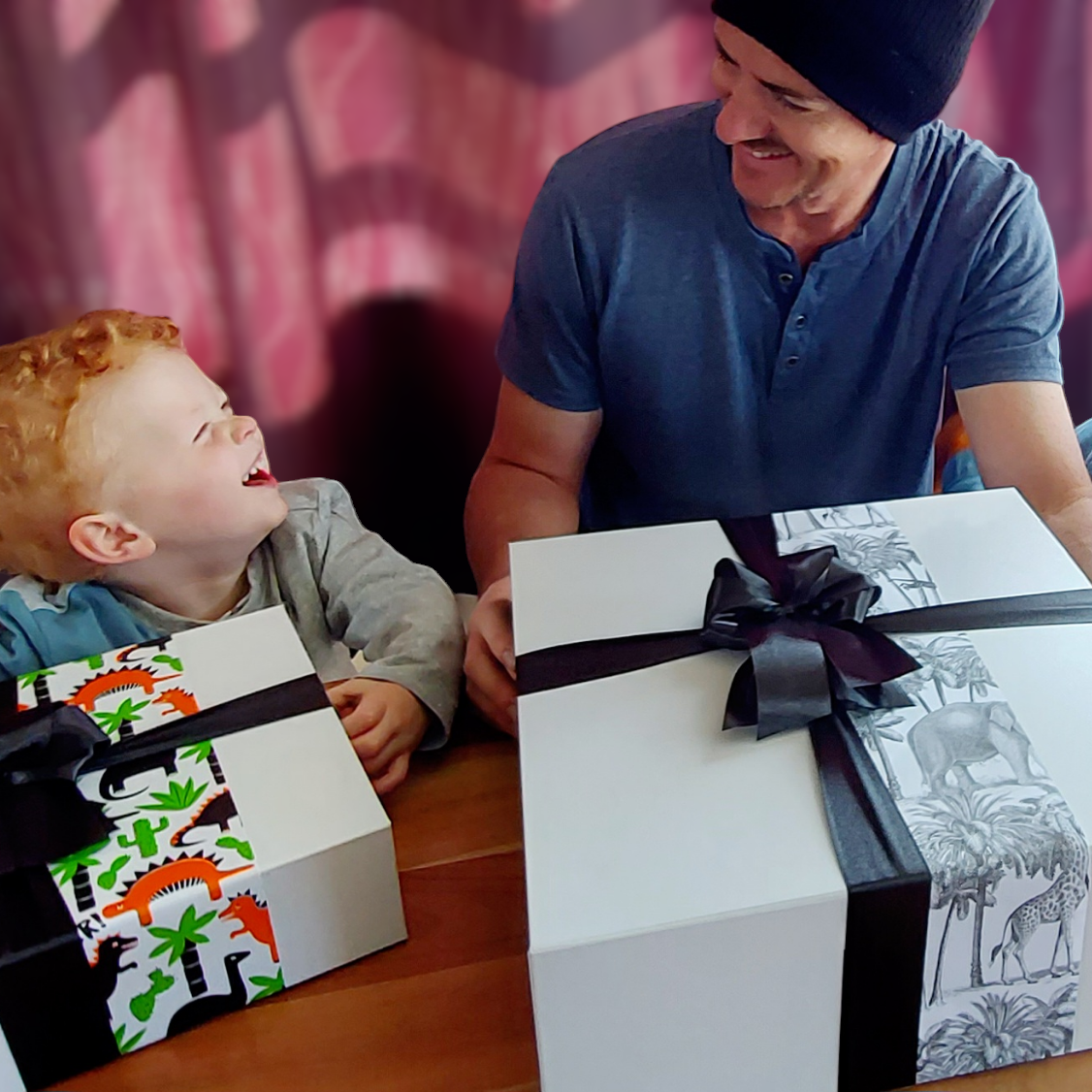 man and child in whangarei receiving wickedly Indulgent gift hampers.