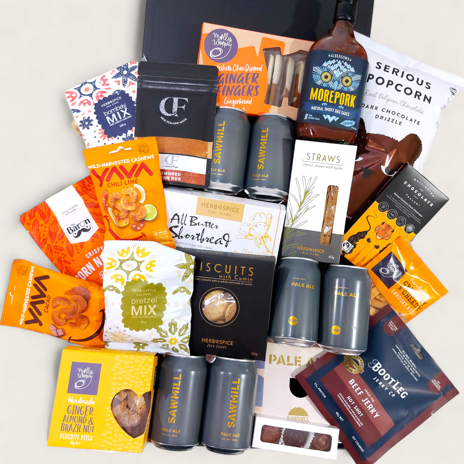 Beer Bonanza Gift hamper for the beer enthusiast filled with 6 craft beers and a large assortment of chocolate, chips, pocorn and snacks best enjoyed with beer. Presented in a modern gift box.