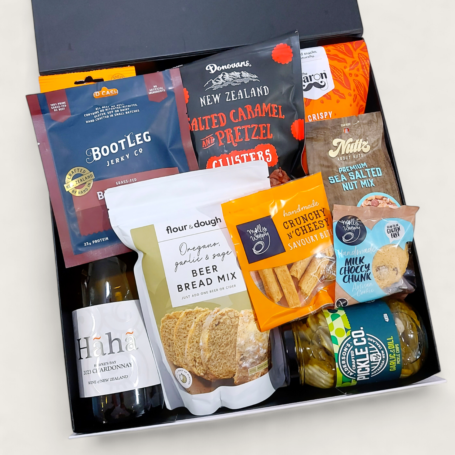 Mens Gift Basket with wine, jerky, pickles, whisky pickled carrots and more all beautifully presented in a modern gift box