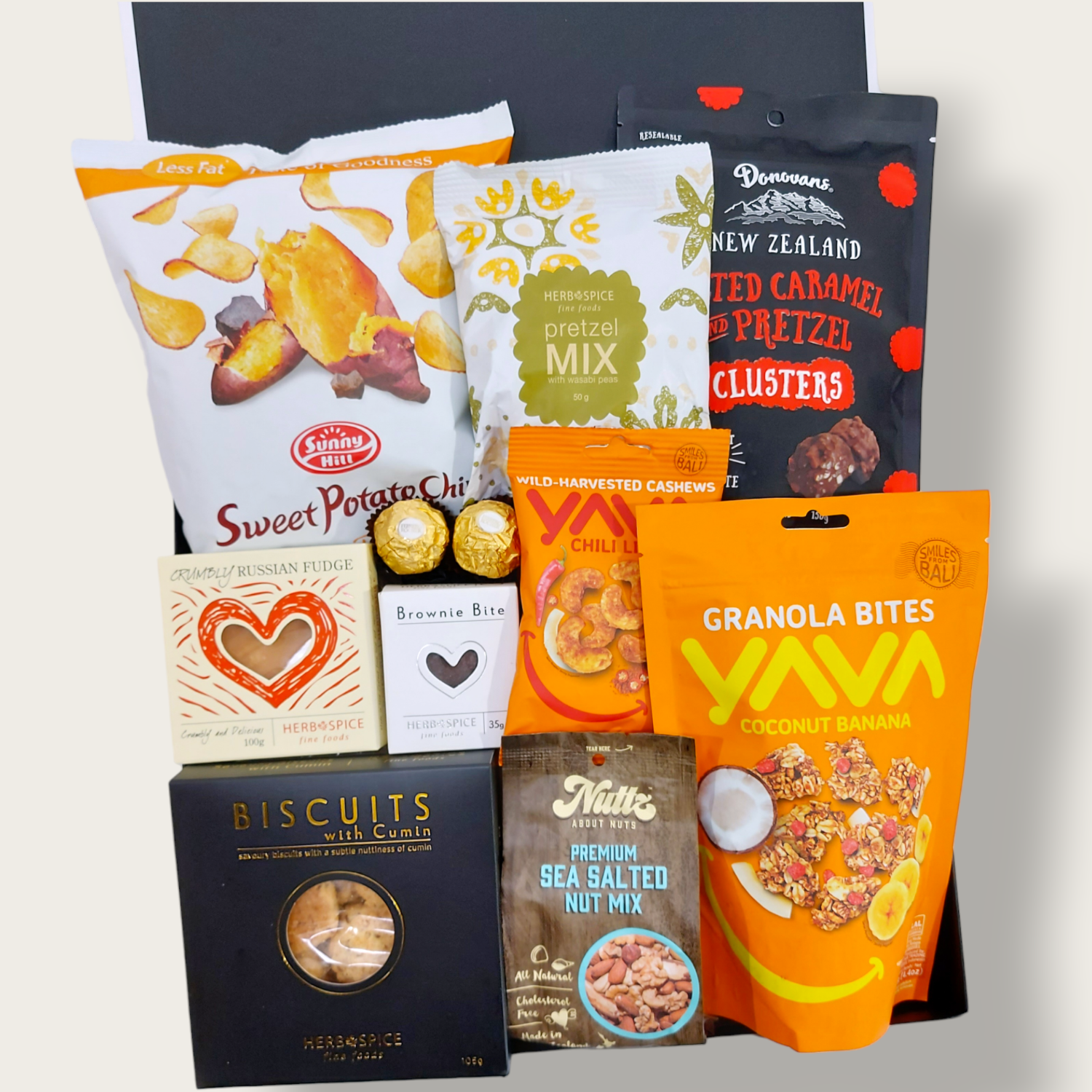In a pickle gift basket. Sweet and savoury snacks presented in a modern gift box.