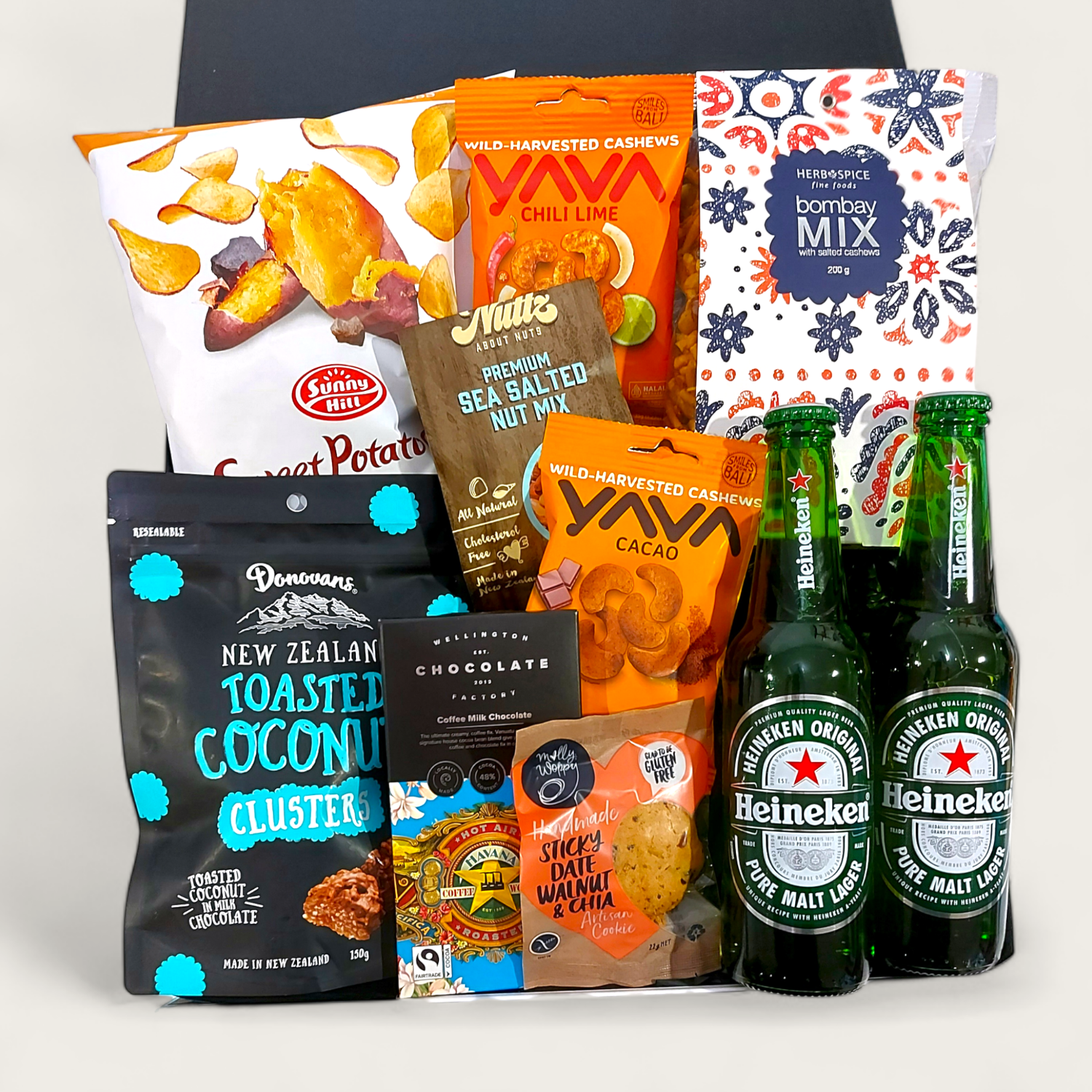 Just for him gift basket for men with Beer. Nuts, Chips, Chocolate & more presented in a modern gift box.