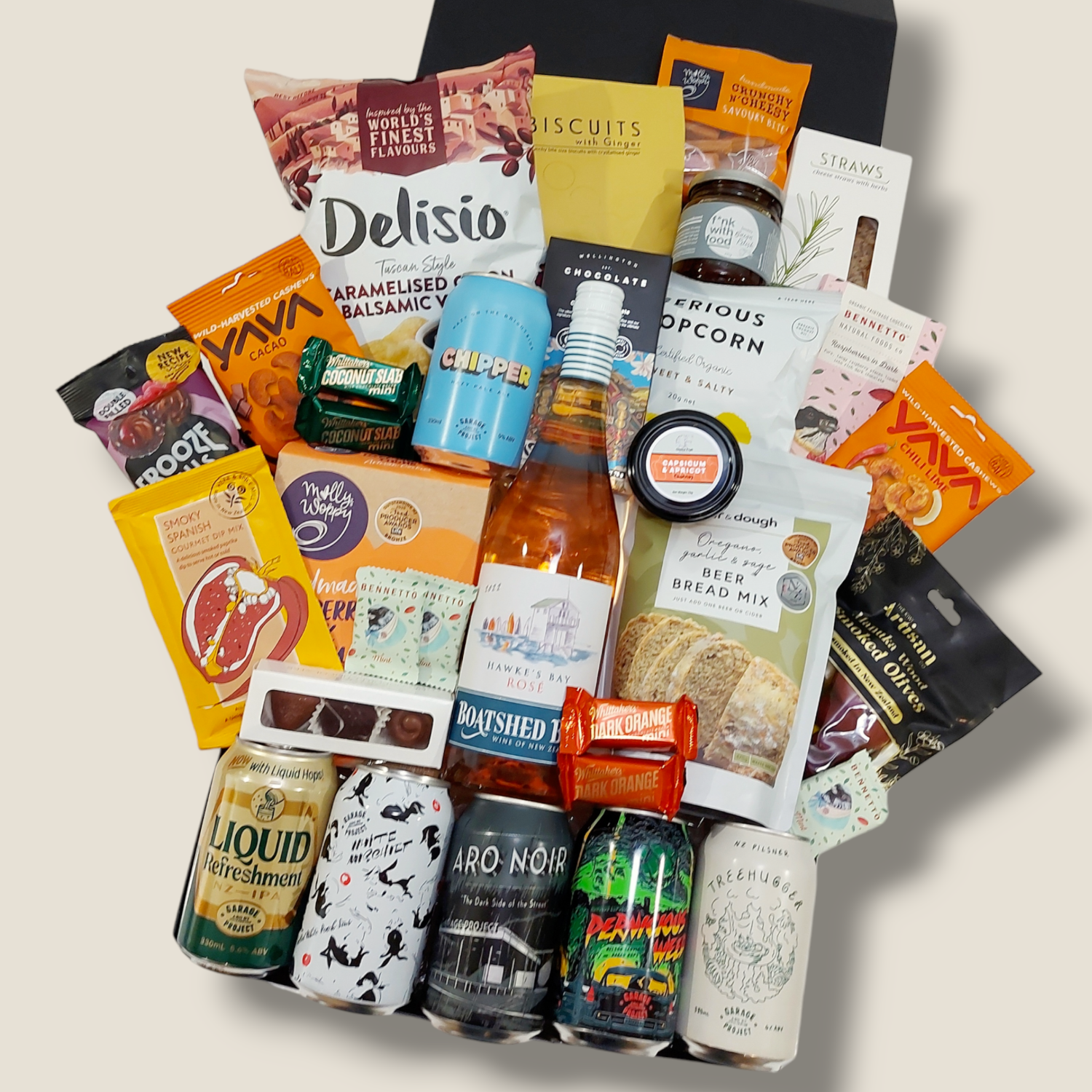 His & Hers wine & craft beer gift box with chocolate, biscuits, beer bread, chutney, cashews & more. Presented in a modern gift Box.