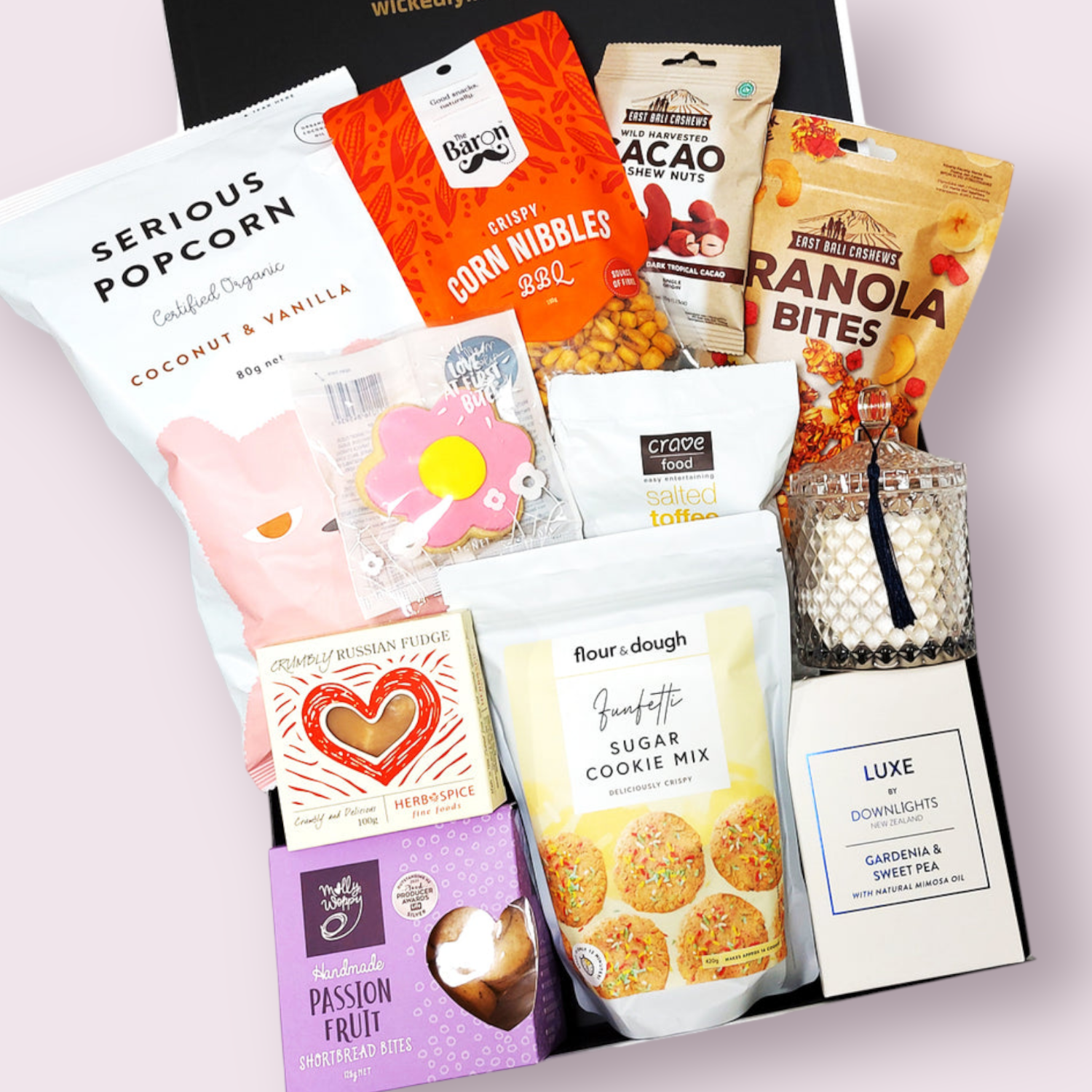 Amazing Thank you gift box with cookie mix, candle & sweet treats. Presented in a modern gift box.