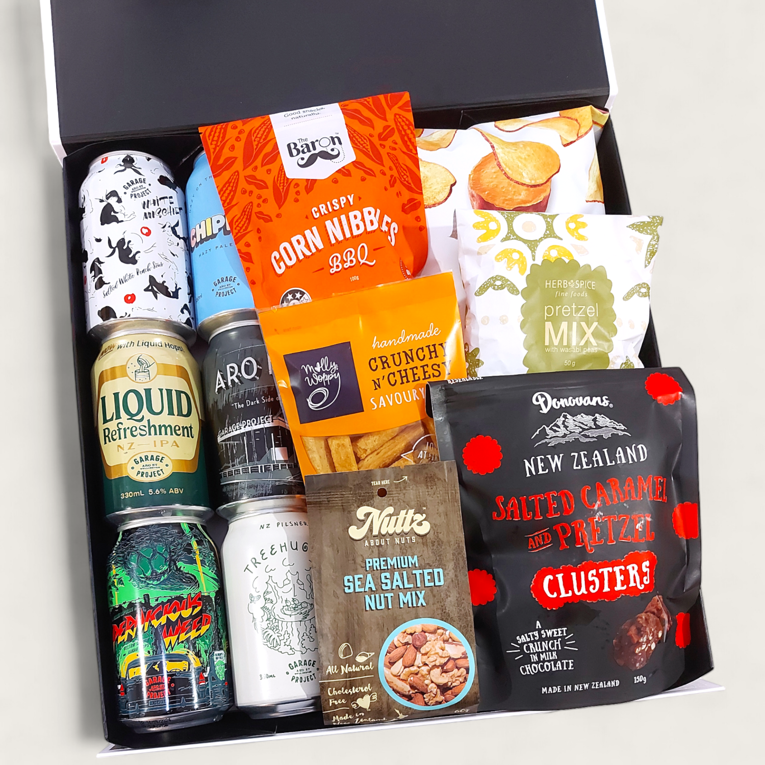 Tools Down gift hamper with craft beer, nuts, chocolate, pretzels and popcorn all presented in a modern gift box.