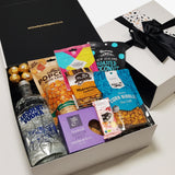 100% Chance of vodka- Absolut vodka gift basket with sweet and savoury gourmet nibbles all presented in a modern Gift Box.