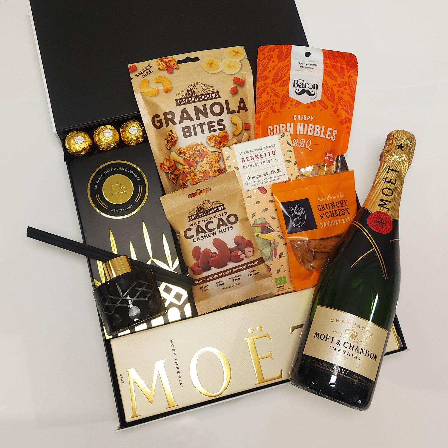 Celebrate Good Times Champagne & Room Diffuser House warming gift basket presented in a modern gift box.