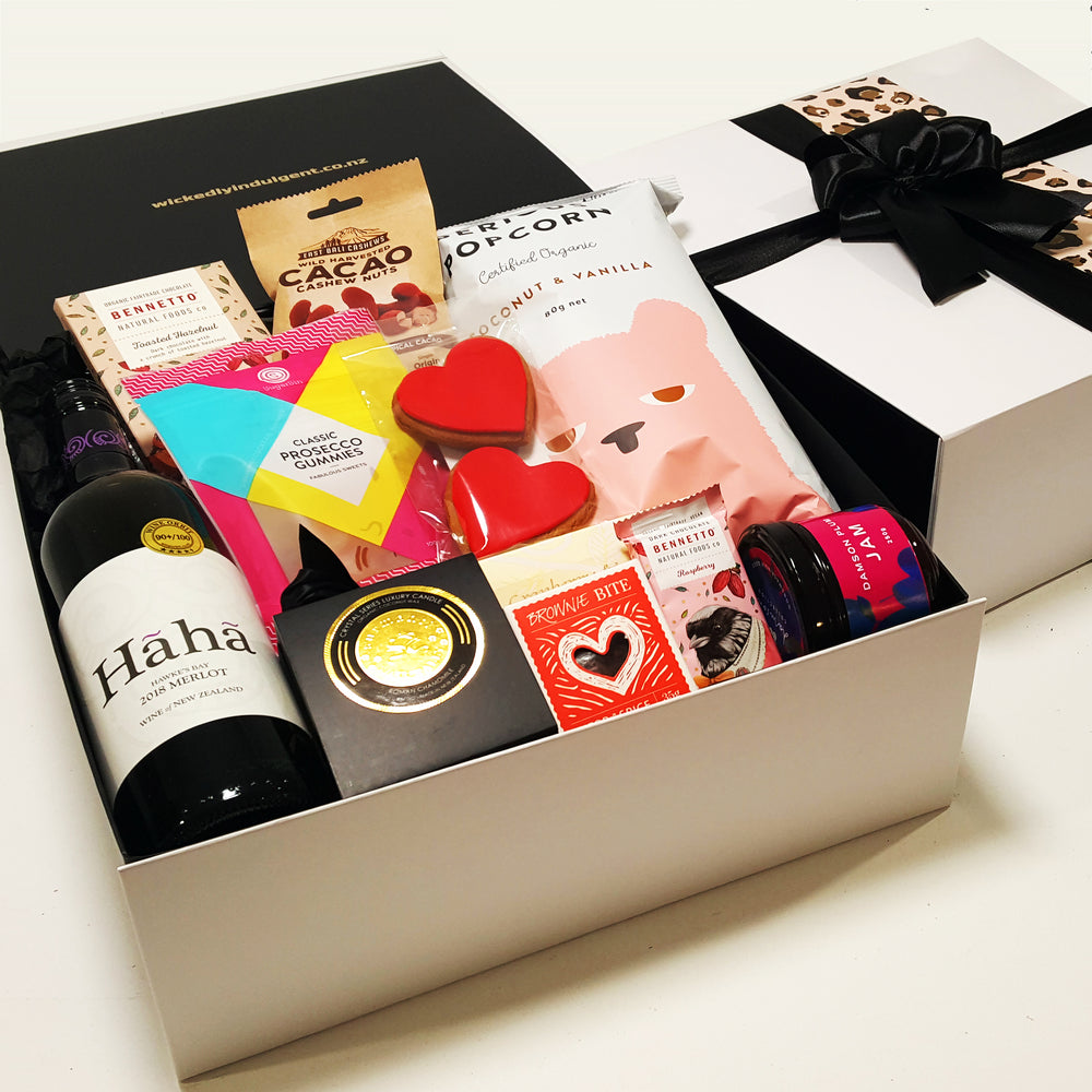 Number one Mum Mothers Day gift hamper with wine, candle, jam, and sweets, presented in a modern gift box.