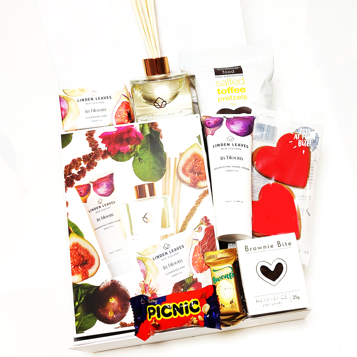 Pamper Me Gift Box with LInden Leaves diffuser, handcream & cleansing bar along with a few indulgent sweet treats.