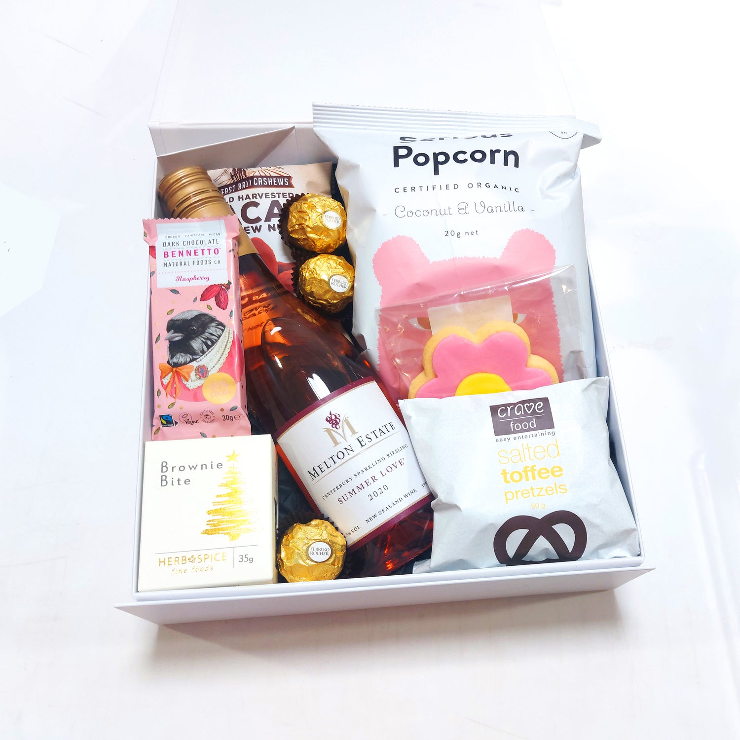 Summer love gift Basket with Sparkling Riesling, Popcorn, Pretzels and Nibbles. Presented in a modern gift box.