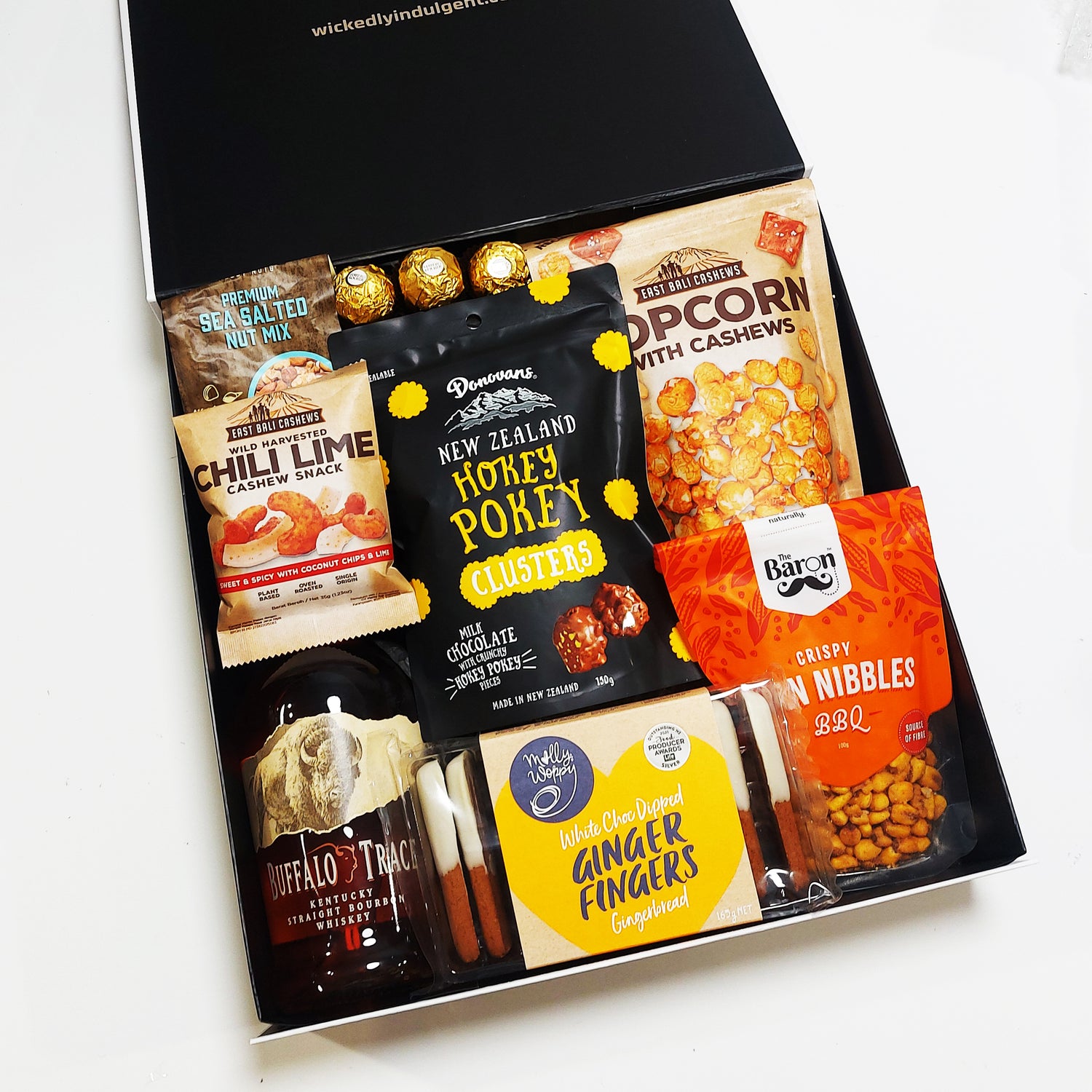 Sip & Snack Bourbon Gift Hamper with Popcorn, Chocolate, Cashews, & More. All presented in a modern Gift Box.