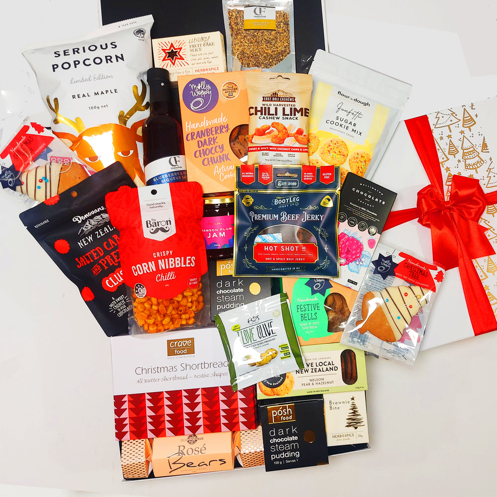 Non alcoholic Christmas Gift Hamper with jerky, pudding, fruit cake, jam, cookies and more. Presented in a modern Gift Box.