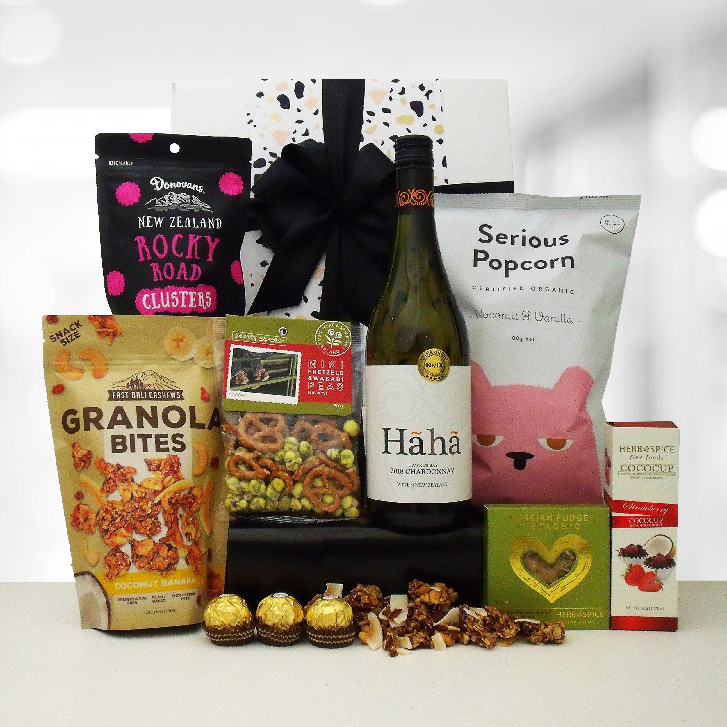 Wickedly Indulgents selection of gourmet Gift Hampers & Gift Baskets with wine, specially made to treat her.