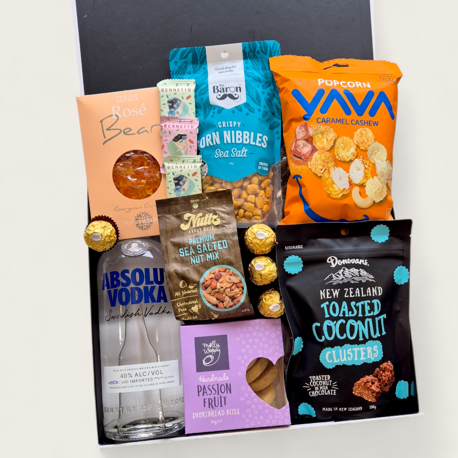 100% Chance of vodka- Absolut vodka gift basket with sweet and savoury gourmet nibbles all presented in a modern Gift Box.