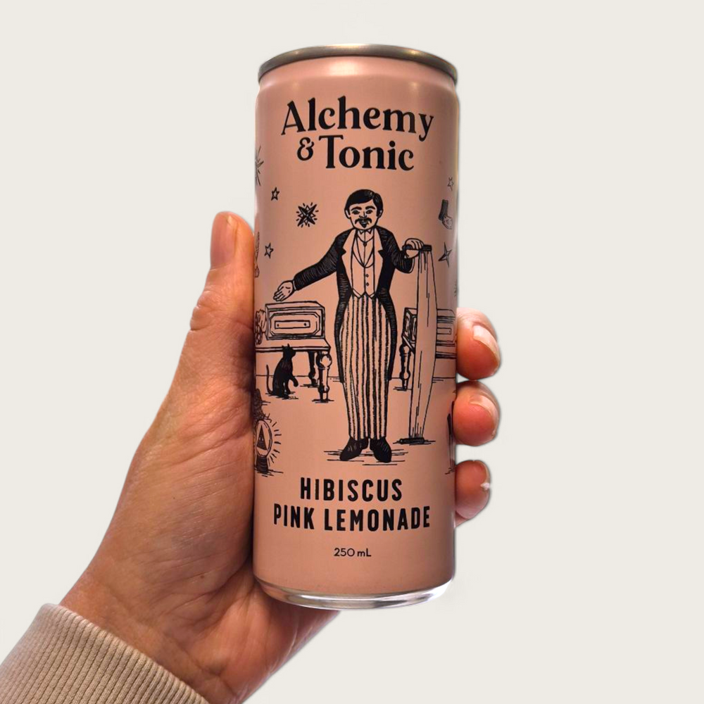 Alchemy & Tonic Hibiscus Pink Lemonade bottle – a refreshing pink drink infused with rose and lemon, perfect as a gift box add-on