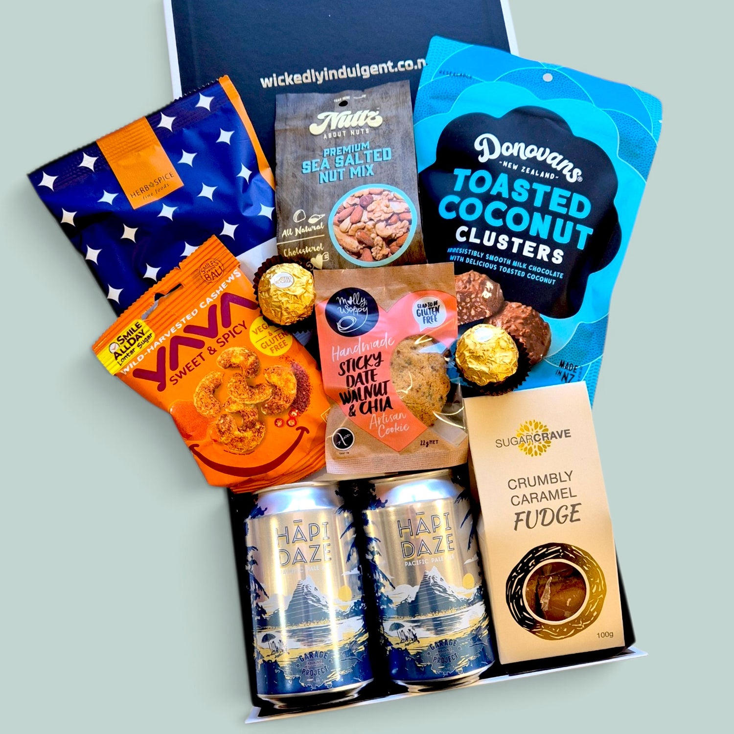 Gift hamper with Garage project Hapi Daze craft beer and snacks including nuts, Donovan's chocolate and cookies, perfect gift for him. NZ wide delivery