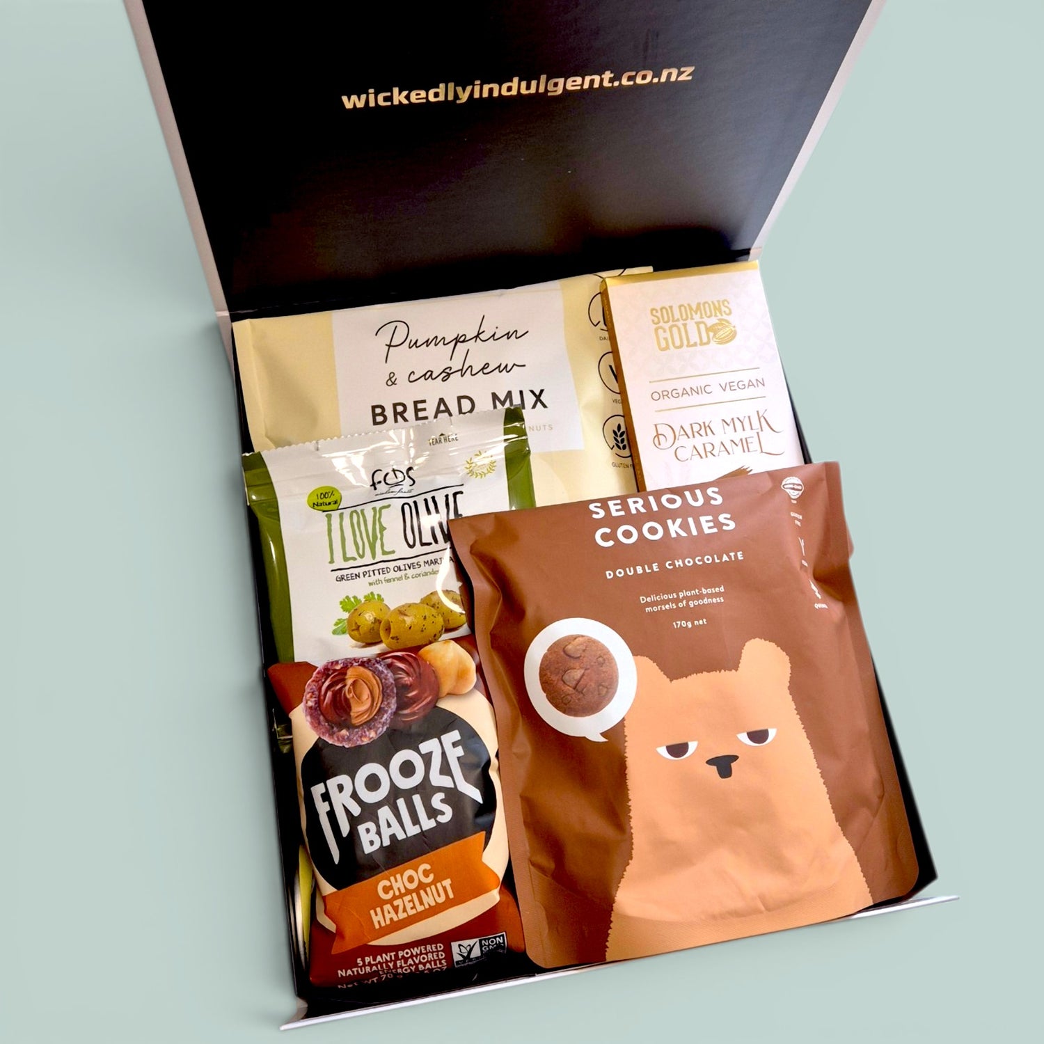 Gluten free and dairy free gift hamper with Pete’s Naturals drink, bread mix, dairy free chocolate, cookies, olives and Frooze Balls.