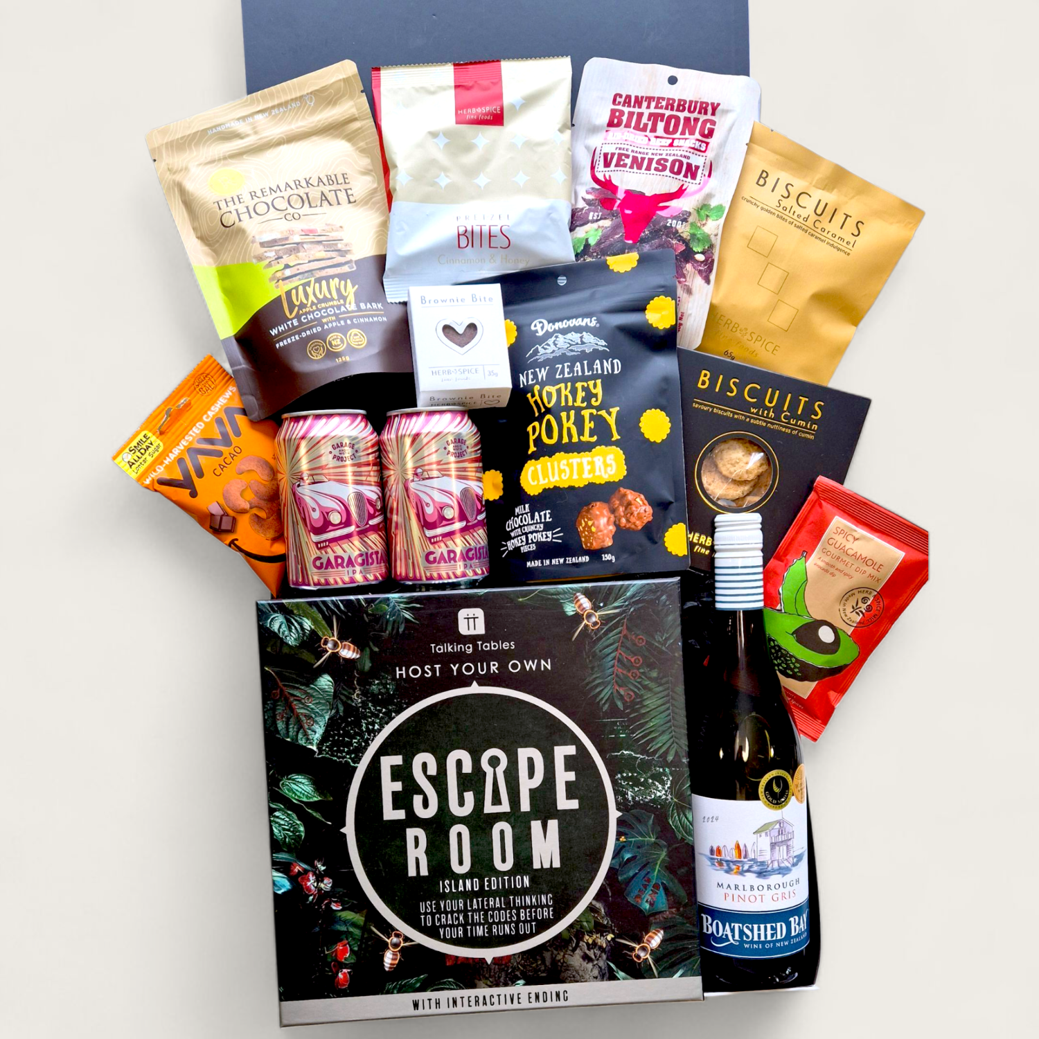 Ales, Alibis & Accusations gift box with craft beer, snacks, and a Escape Room game, perfect for team or Friendmas gifting.