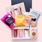 Blush and Indulge Mother’s Day hamper with pink pamper products, chocolates and sweet treats in a luxury gift box