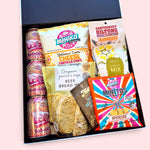 Beer gift hamper with Garage Project cans, beer bread mix, biltong, tortilla chips, nut mix, pretzels and savoury treats, in a modern gift box.
