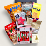 Wickedly Indulgent Festive Fix Hamper filled with holiday snacks, Christmas crackers, and gourmet goodies.