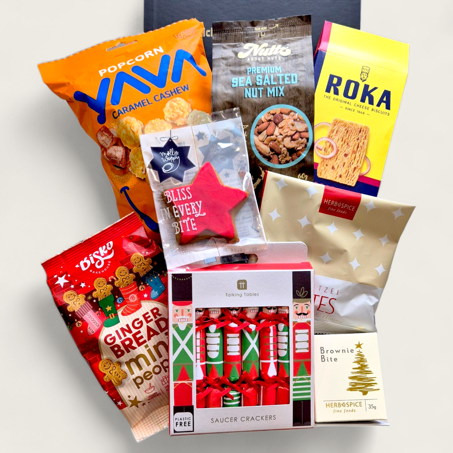 Wickedly Indulgent Festive Fix Hamper filled with holiday snacks, Christmas crackers, and gourmet goodies.