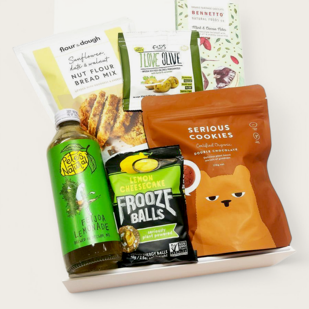 Gluten Free & Dairy Free gift box with frooze balls, cookies, drink, bread mix, olives & Chocolate. Presented in a modern gift box.