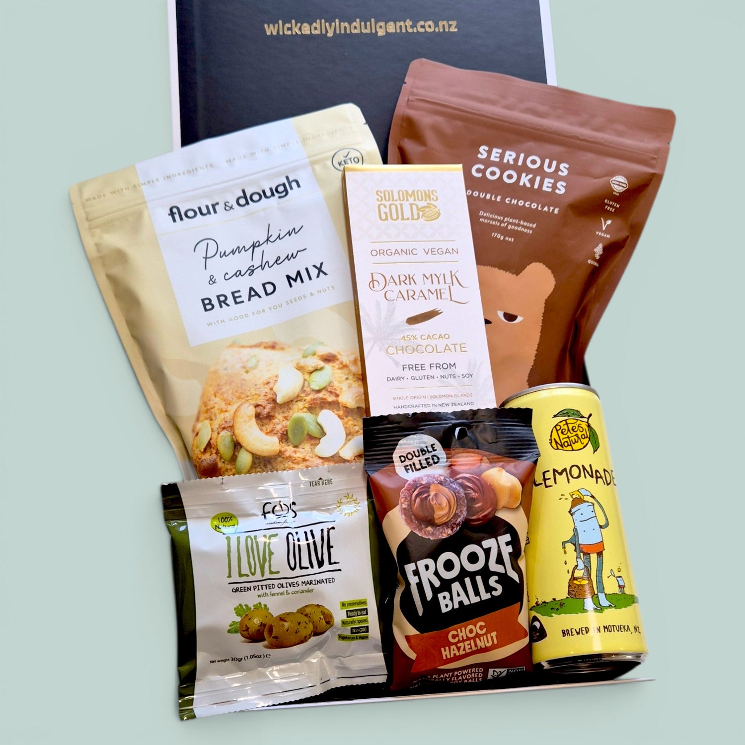 Gluten free and dairy free gift hamper with Pete’s Naturals drink, bread mix, dairy free chocolate, cookies, olives and Frooze Balls.