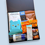 Gluten-free dairy-free gift hamper NZ with Absolut Vodka, Yava cacao 
cashews, Serious Popcorn, Solomon's Gold chocolate, Frooze Balls and 
East Bali cashews — Wickedly Indulgent you choose the booze gift box