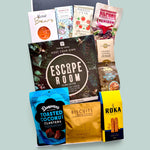 Non-alcoholic gift box with Escape Room or Murder Mystery game & artisan snacks. perfect for families, friends, or teams.