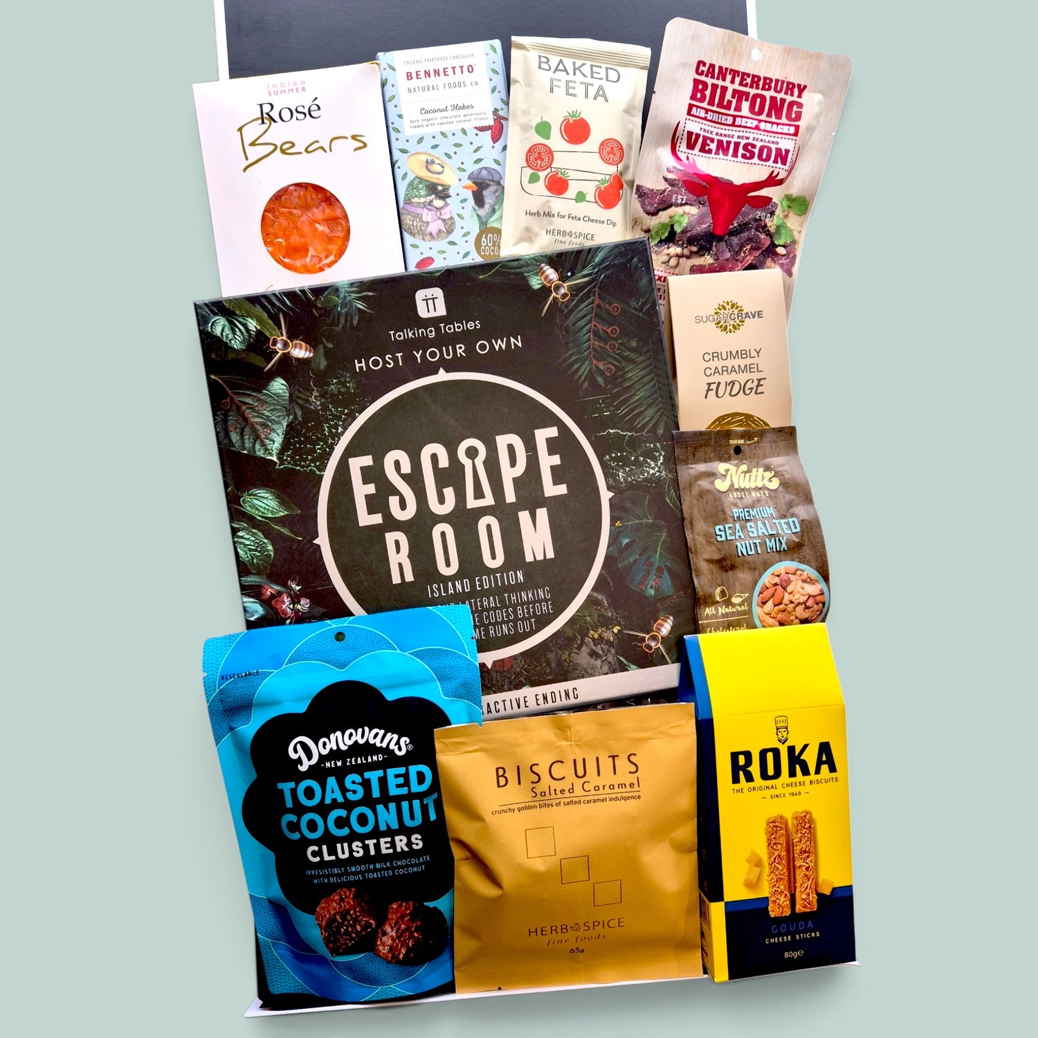 Non-alcoholic gift box with Escape Room or Murder Mystery game & artisan snacks. perfect for families, friends, or teams.