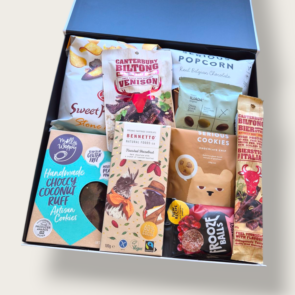 Gluten and dairy free gift box filled with sweet and savoury snacks, including cookies, popcorn, and treats. Perfect for allergy-friendly gifting.