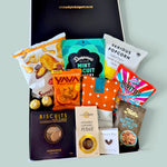 In a Pickle gourmet gift hamper with sweet and savoury snacks, chocolate, nuts, biscuits and fudge, beautifully presented in a Wickedly Indulgent gift box.