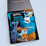Little Whale Wishes baby gift box featuring a crocheted blue whale rattle, gourmet New Zealand treats and beautifully presented gift box.