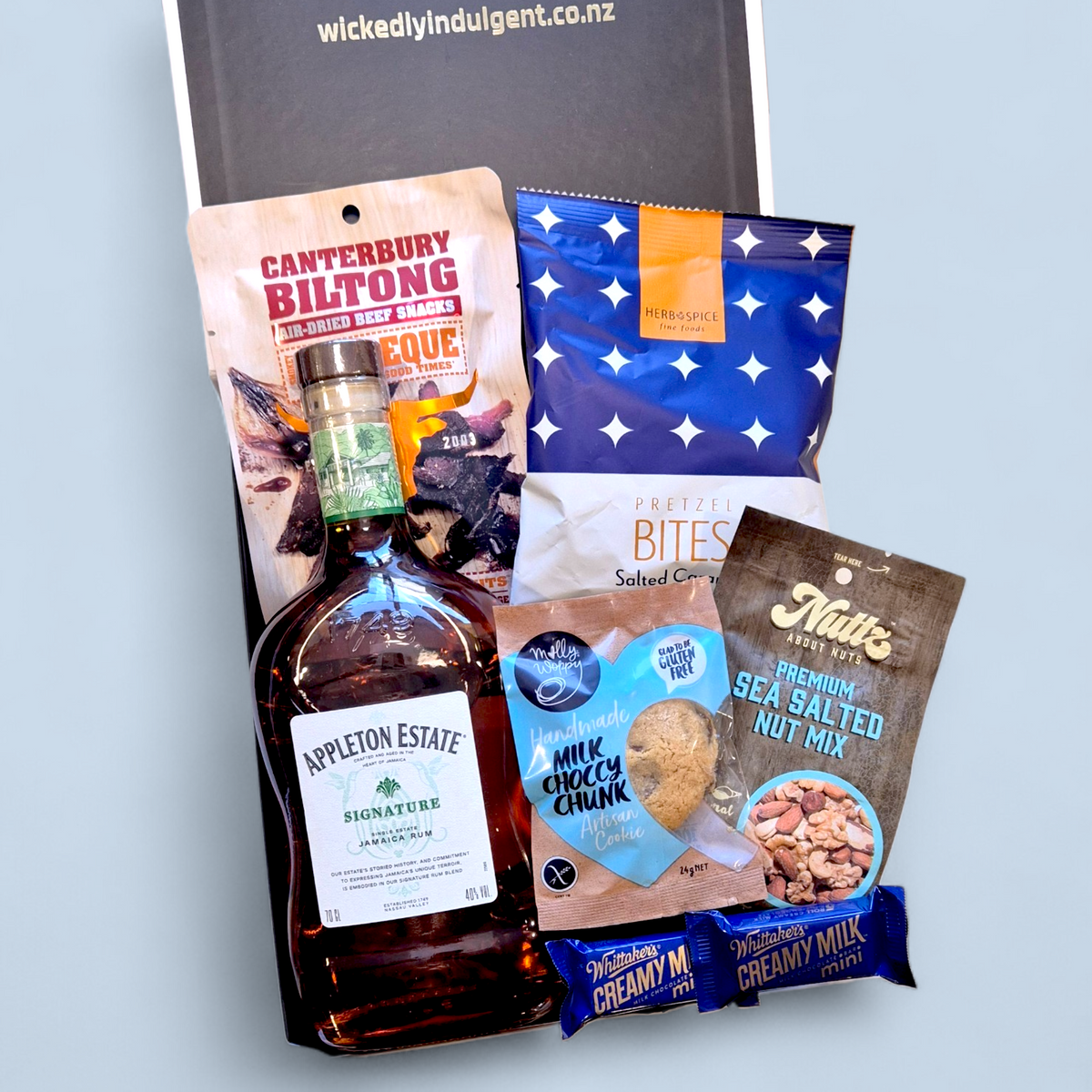 Man Treats gift box with rum, biltong, nuts and chocolate in premium NZ hamper