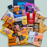 Large non-alcoholic gift hamper with chocolates, cookies, nuts, chips, crackers, biltong, cashews and gourmet sweet and savoury treats.