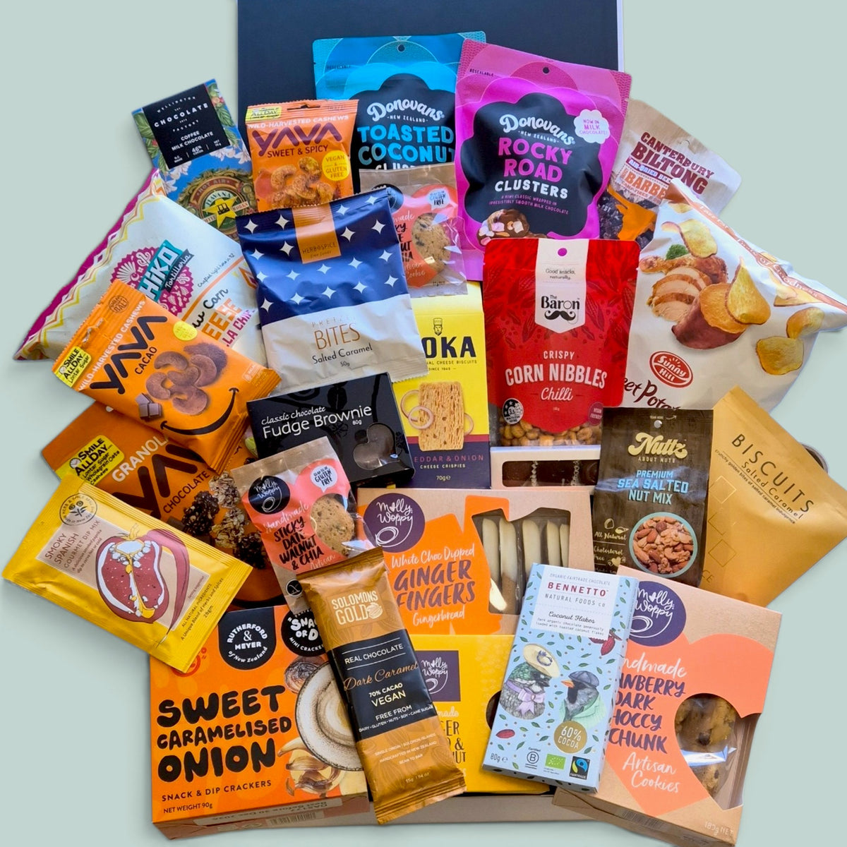 Large non-alcoholic gift hamper with chocolates, cookies, nuts, chips, crackers, biltong, cashews and gourmet sweet and savoury treats.