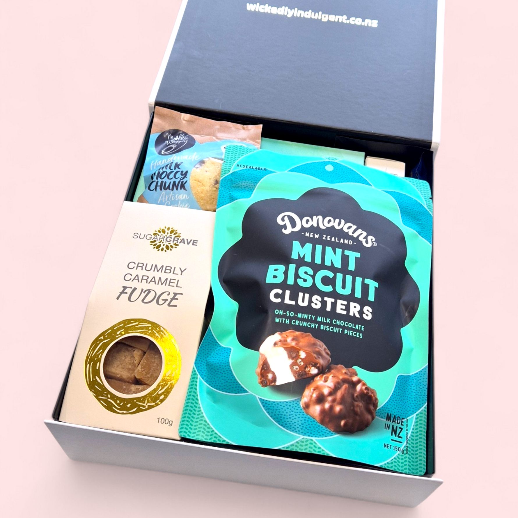 Pamper gift hamper for Mum with self-care products, chocolate and treats, beautifully packaged in a luxury gift box NZ delivery