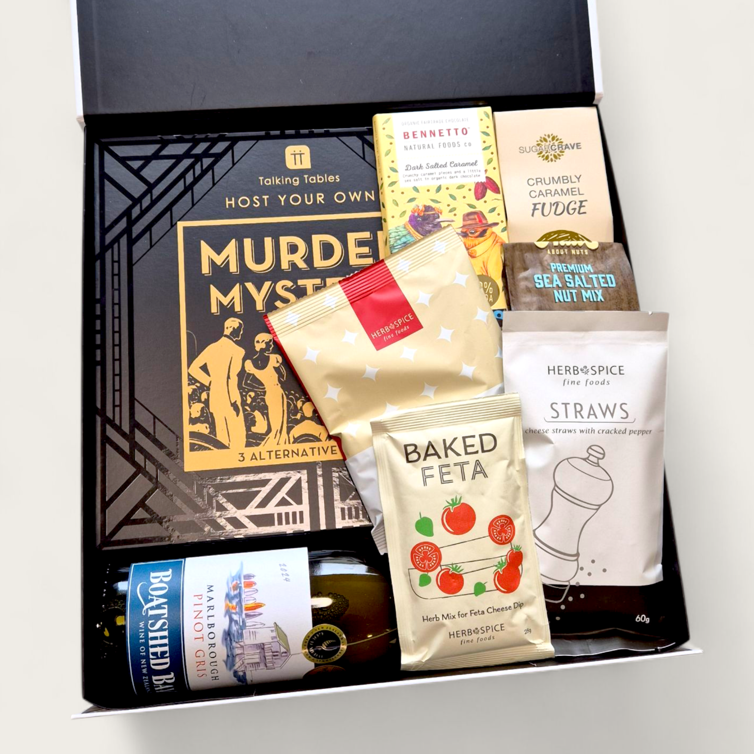 Murder Mystery gift hamper filled with artisan snacks and drinks, great for team or family game nights.
