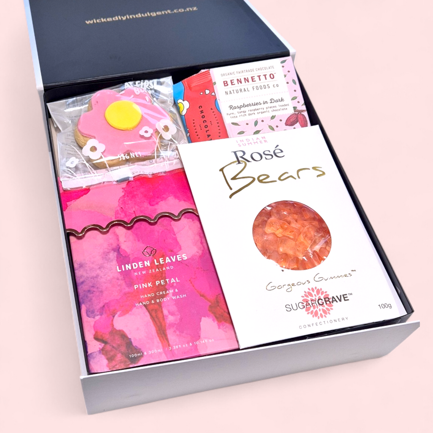 Pink themed pamper gift hamper for Mum with self care products and chocolates, NZ wide delivery