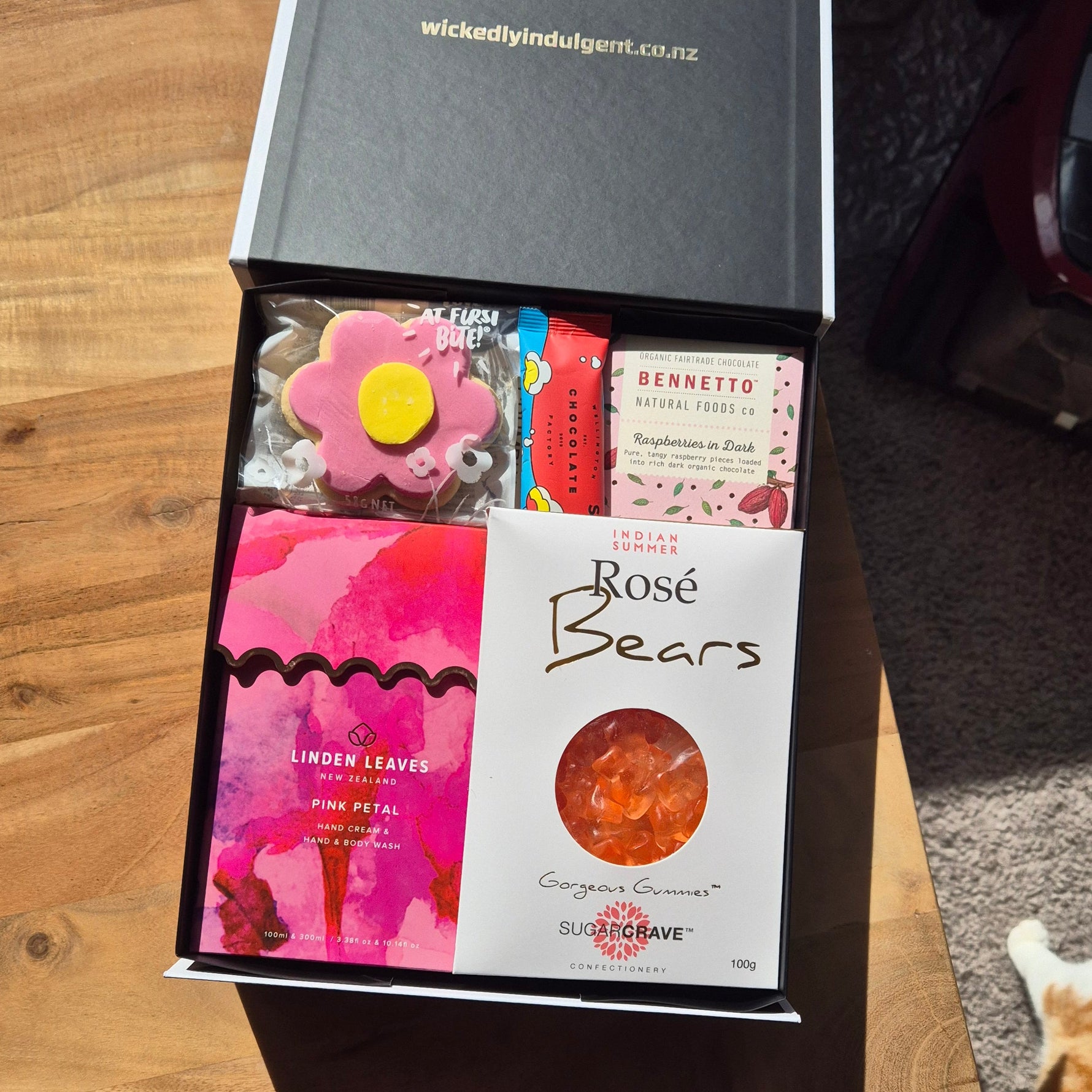 Pink themed pamper gift hamper for Mum with self care products and chocolates, NZ wide delivery