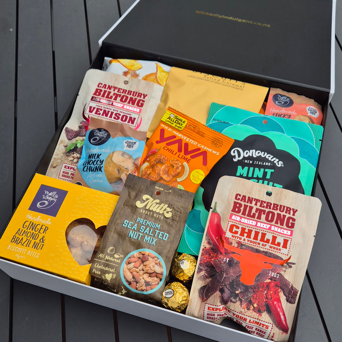 Gift hamper with biltong and savoury snacks including nuts, cookies and chocolate, delivered NZ wide