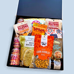 Premium craft beer and savoury snack gift hamper featuring beer, biltong, chips, cashews, nut mix and beer bread mix in a Wickedly Indulgent gift box.