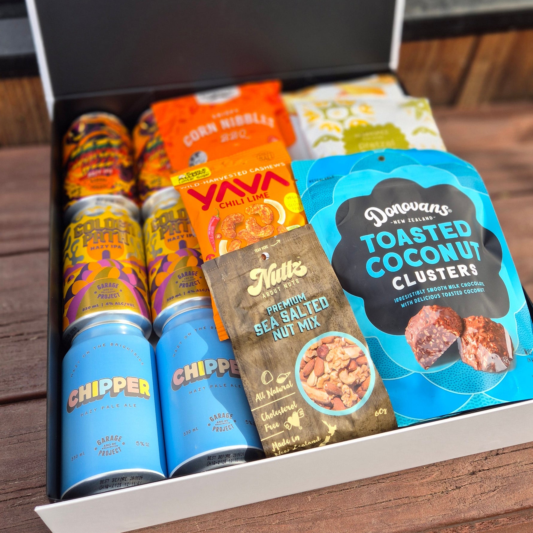 Tools Down gift hamper with craft beer, nuts, chocolate, pretzels and popcorn all presented in a modern gift box.
