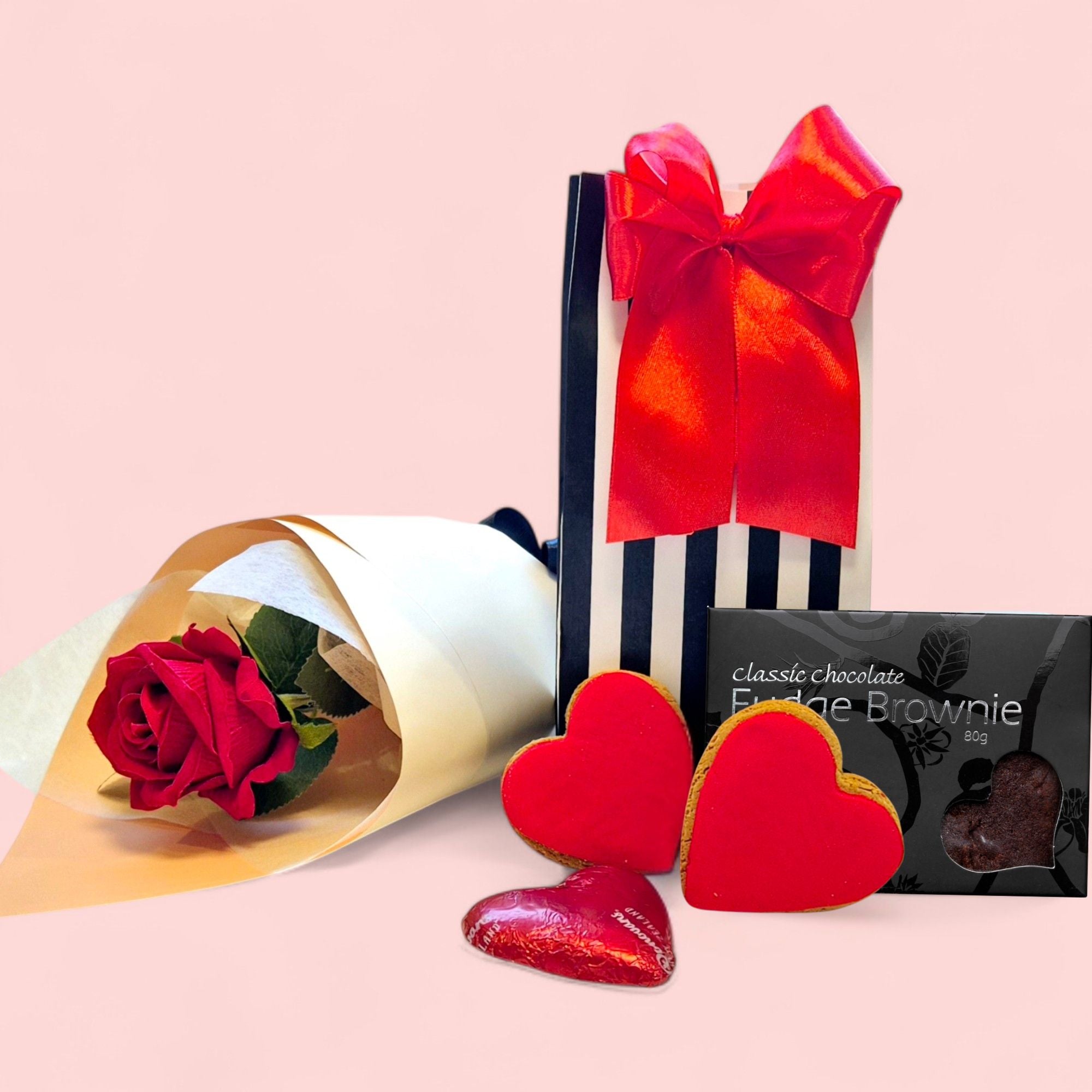 Artificila red roses and snacks valentines gift pack