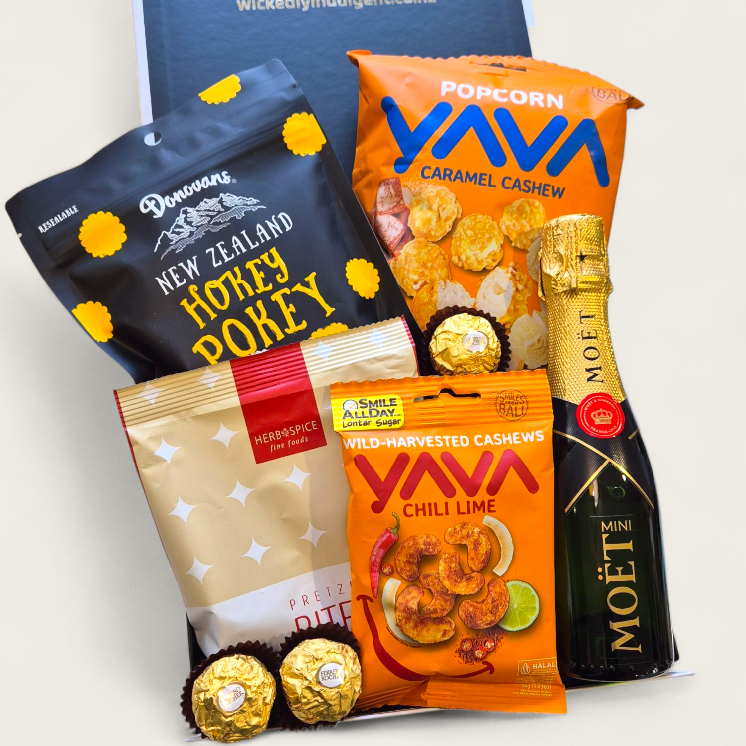 Mini Champagne celebration gift box with Moët, chocolate, popcorn and pretzels