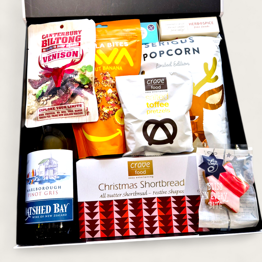 Christmas gift hamper with wine, shortbread, snowballs, fruit cake & Biltong presented in a modern gift box.