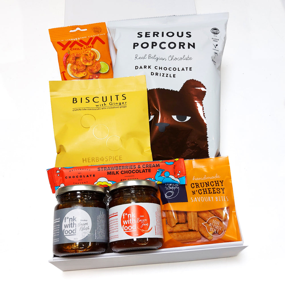 Funk with Food Gift box with two bacon condiments, chocolate, popcorn, biscuits, and cashews. Presented in a modern gift box.
